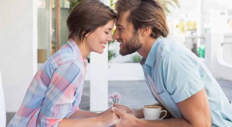 happy couple drinks coffee